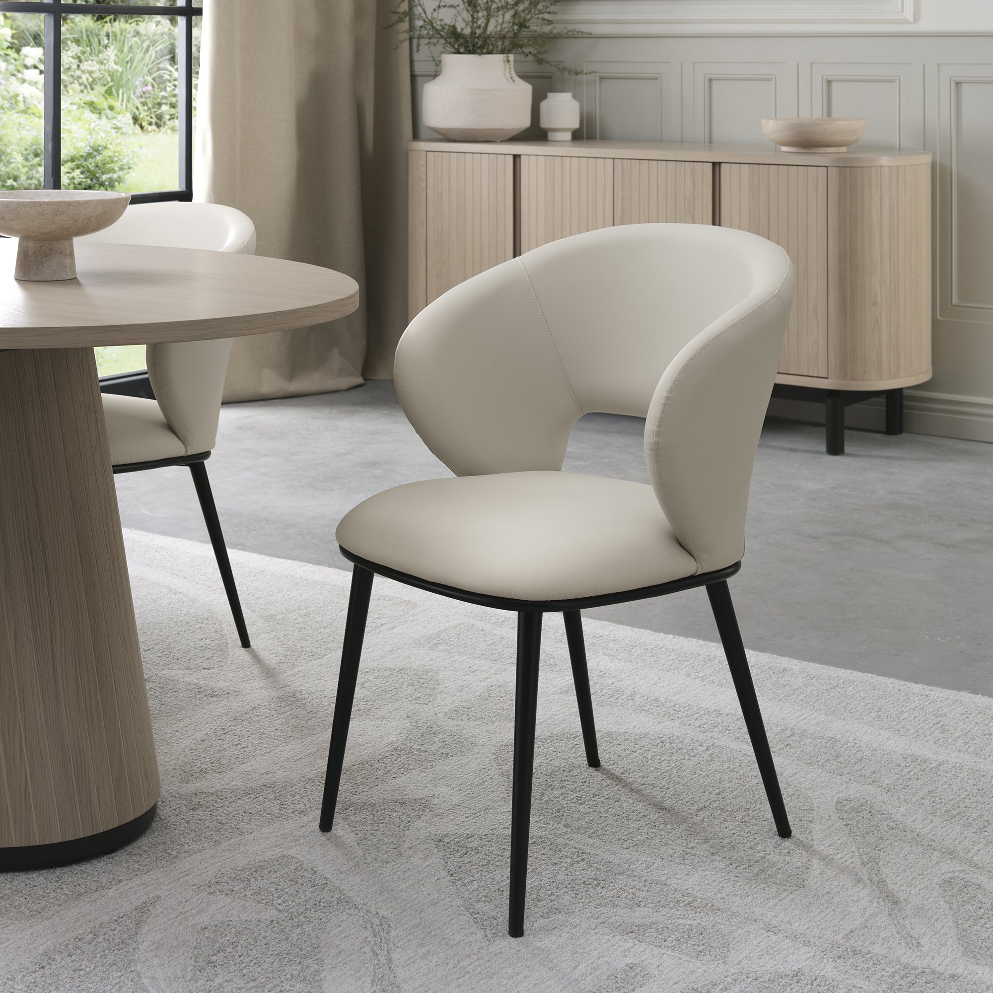 Luca Ivory Faux Leather Chairs with Matt Black Legs