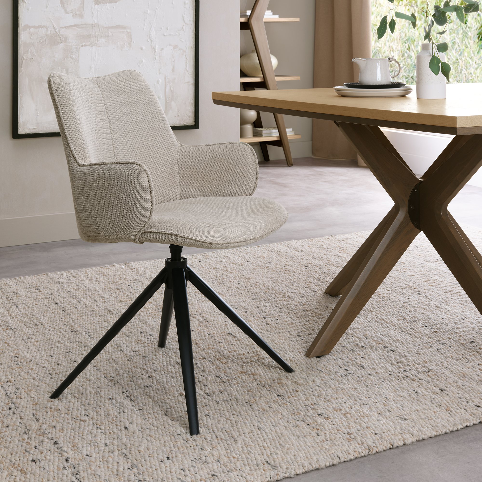 Rowan - 360° Self Returning Swivel Chair in a Beige Fabric with Black Legs
