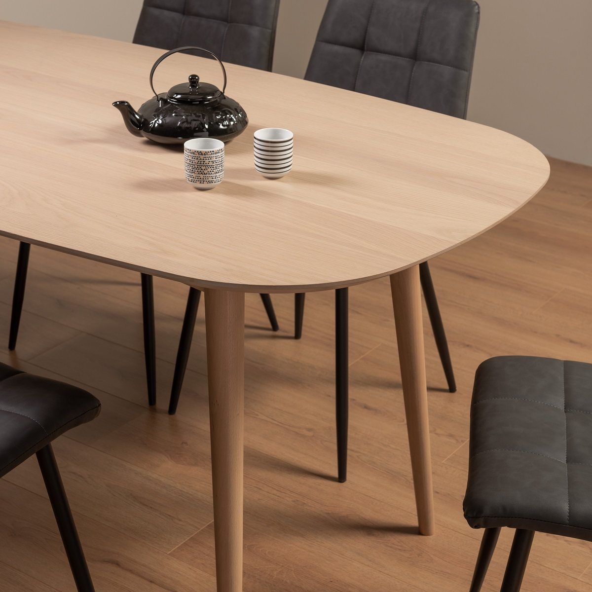 Johansen - Scandi Oak 6 Seater Dining Table & 6 Dark Grey Faux Leather Mondrian Dining Chairs