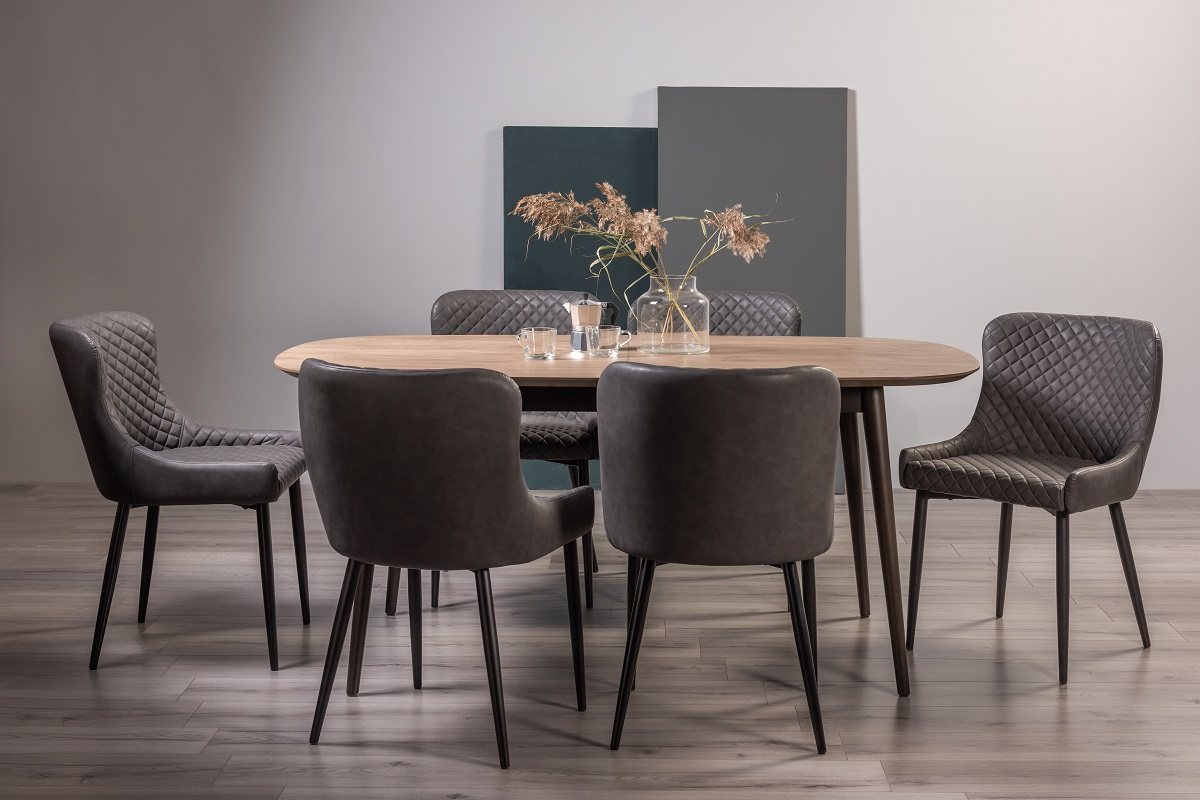 Tuxen Weathered Oak 6-8 Dining Table & 6 Cezanne Chairs in Dark Grey Faux Leather with Black Legs