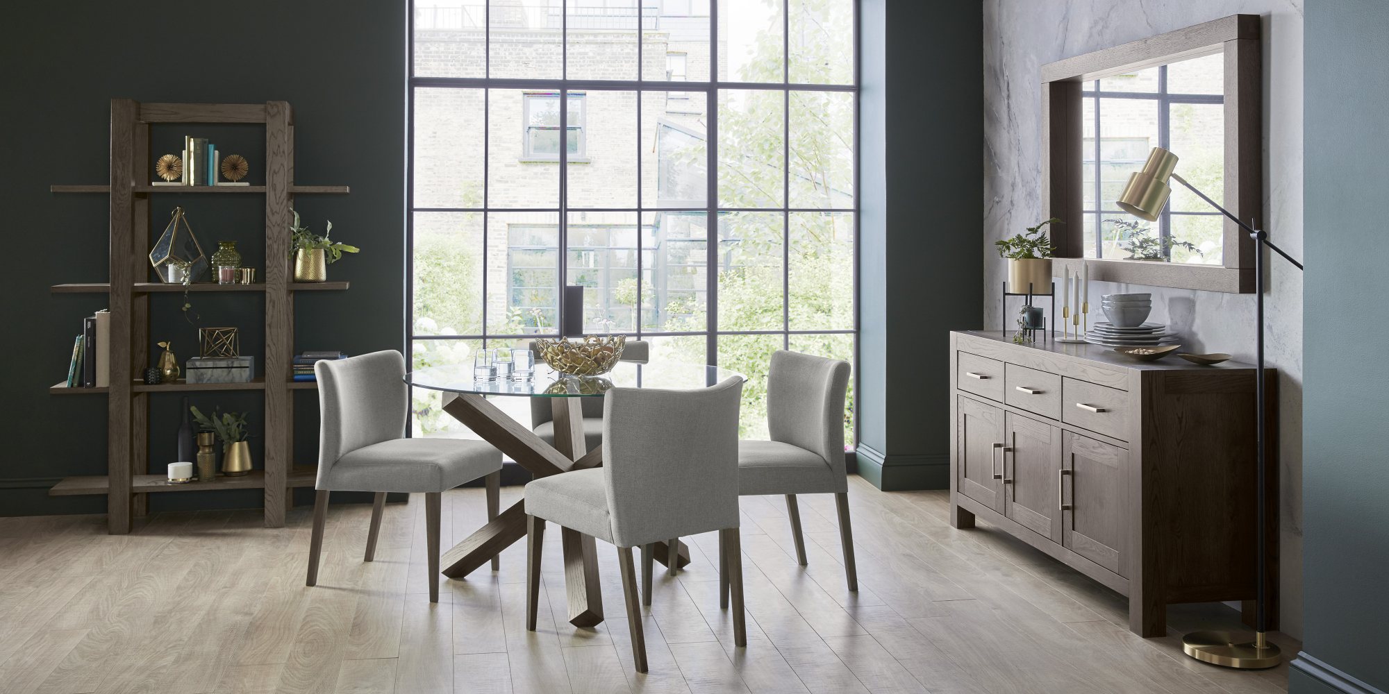 Home Origins Goya Dark Oak Circular Glass Table & 4 Blake Dark Oak Low Back Upholstered Chairs- Pebble Grey Fabric- lifestyle