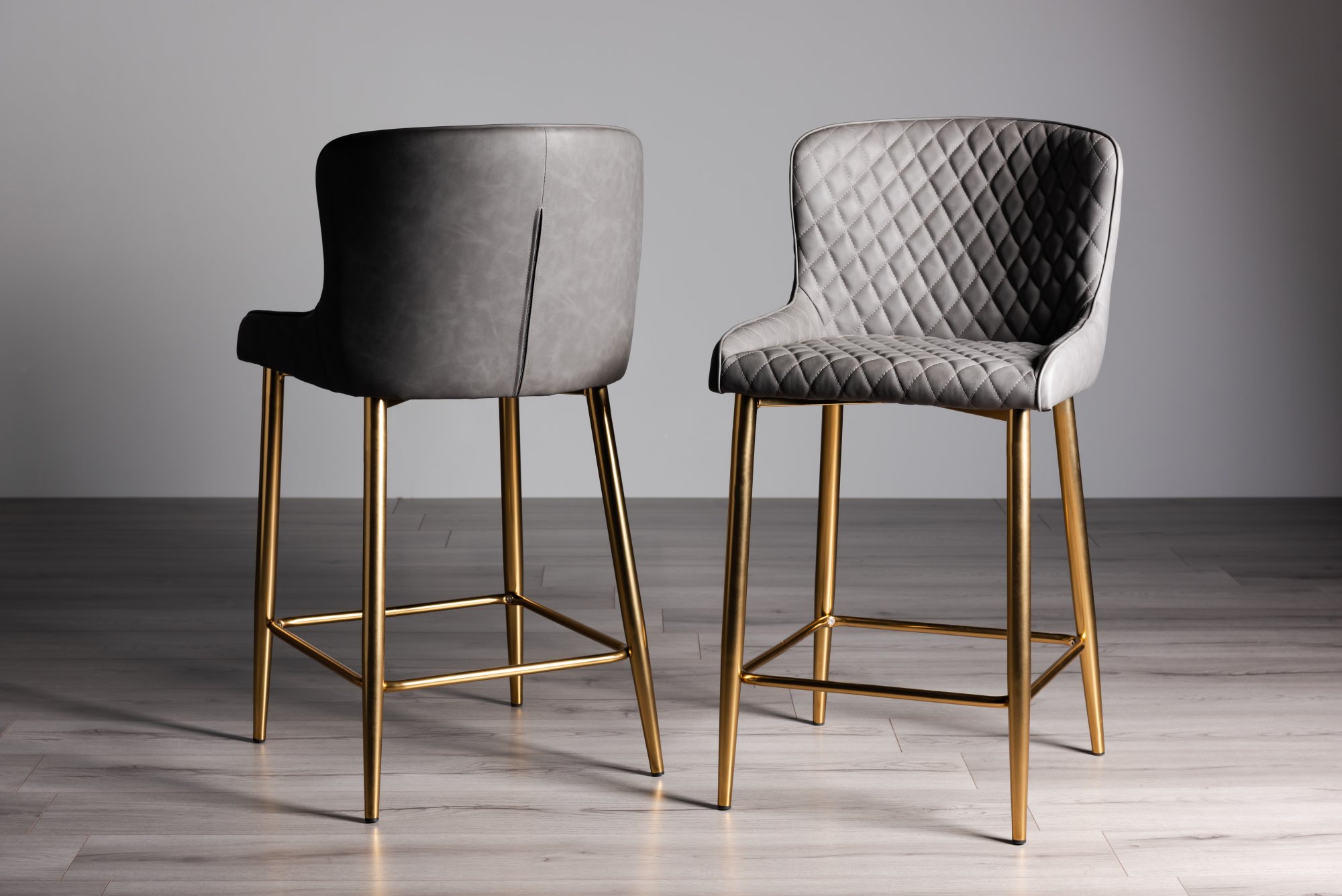 Cezanne Dark Grey Faux Leather Bar Stools with Gold Legs