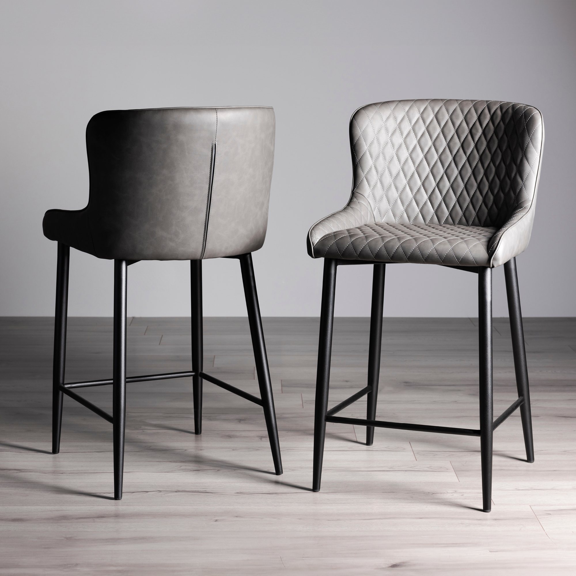 Cezanne Dark Grey Faux Leather Bar Stools with Black Legs