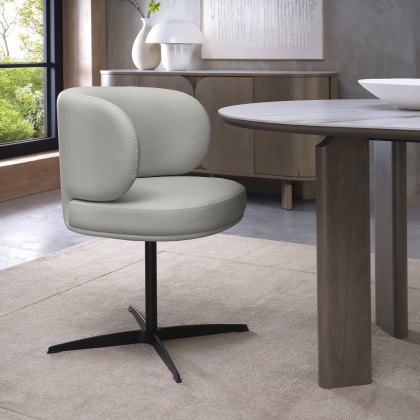 Marcel - 360° Swivel Chair in a Light Grey Faux Leather with Black Legs