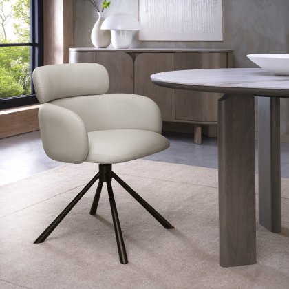 Hudson - 360° Self Returning Swivel Chair in a Ivory Faux Leather with Black Legs