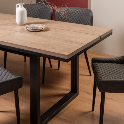 Turner Weathered Oak 4-6 Dining Table & 4 Cezanne Chairs in Dark Grey Faux Leather with Black Legs