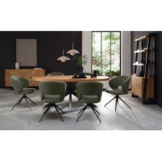 Stella 360° Self Returning Swivel Chair in a Green Boucle Fabric with Black Legs