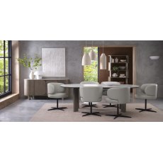 Marcel - 360° Swivel Chair in a Light Grey Faux Leather with Black Legs