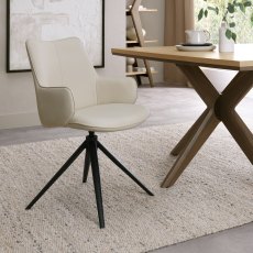 Rowan - 360° Self Returning Swivel Chair in a Ivory Faux Leather with Black Legs