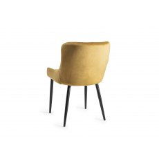 Home Origins Cezanne upholstered dining chair with sand black powder coated legs- mustard velvet fabric- back angle shot