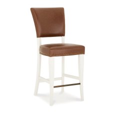 Rivera Ivory Bar Stools in a Rustic Tan Faux Leather