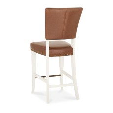 Rivera Ivory Bar Stools in a Rustic Tan Faux Leather