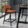 Rosen Peppercorn Upholstered Bar Stool in a Rust Velvet Fabric